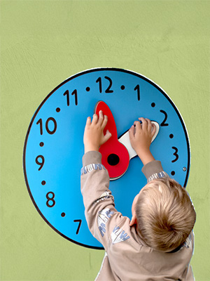 Textured green background with a kid playing with a clock.